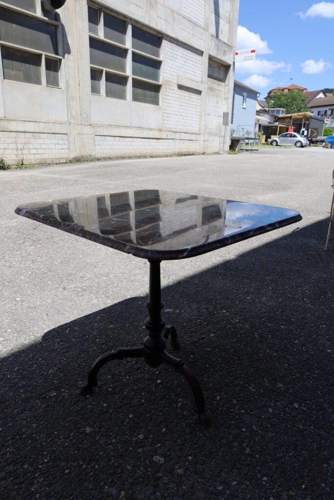 Marble tables with special cast iron legs