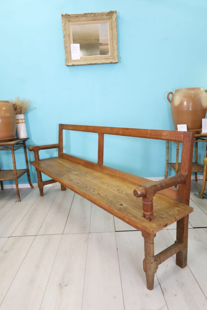 Long antique bench for the dining table