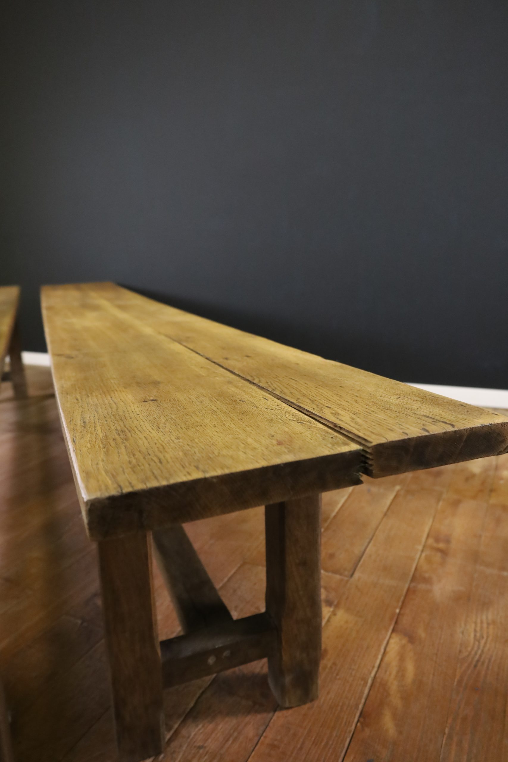 Solid and long oak benches 20th century