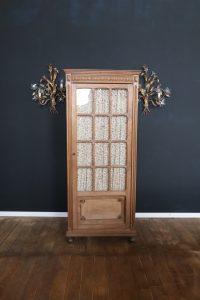 Small single-door oak cabinet in Art Nouveau style