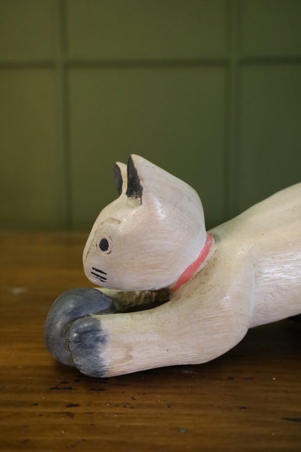 Hand-carved cat figurine