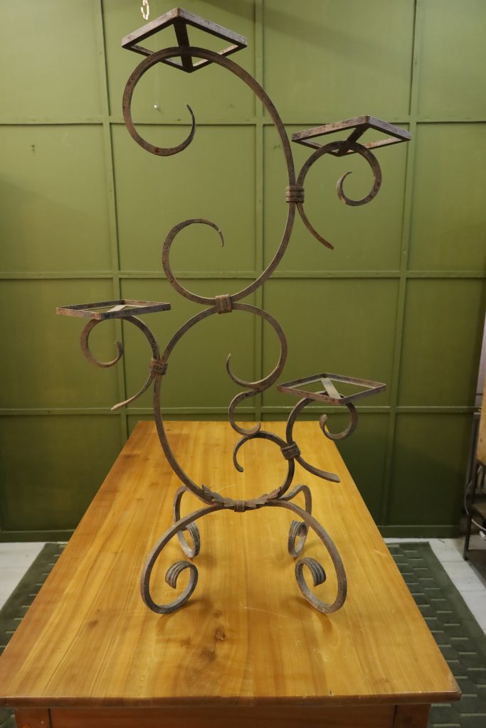 Old decorative wrought iron lamp base