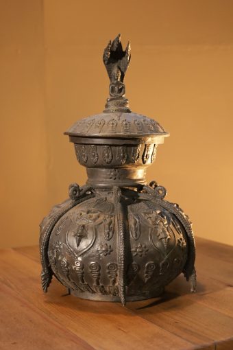 Artistically designed bronze container